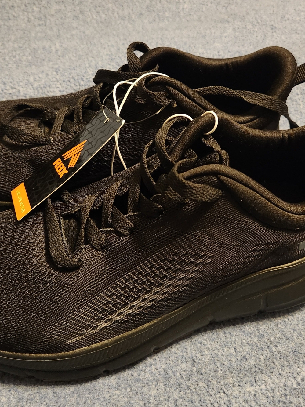 Reebok Black Women's Athletic Sneakers with Orange Logo Tag
